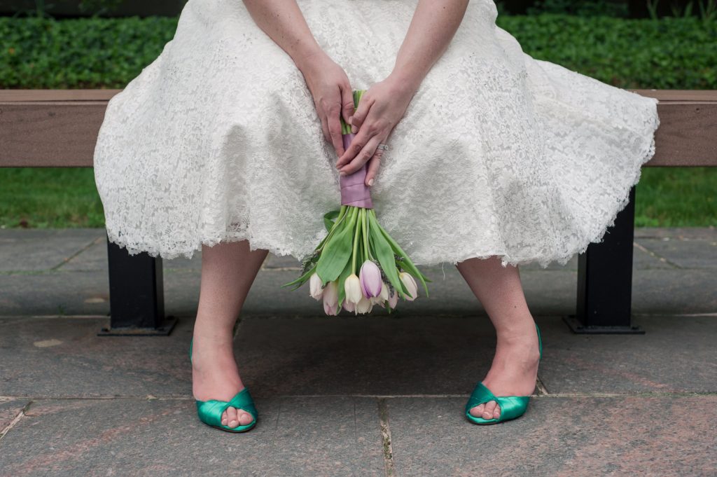 pink tulip bouquet and green wedding shoes