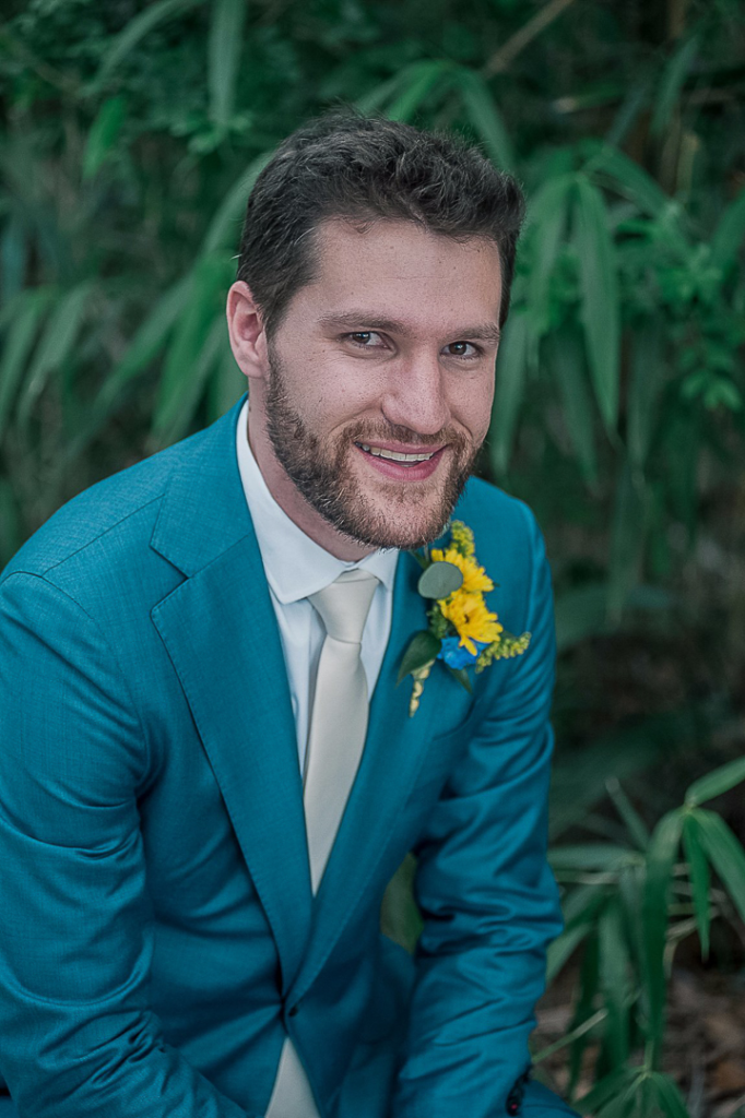 groom in a blue suit