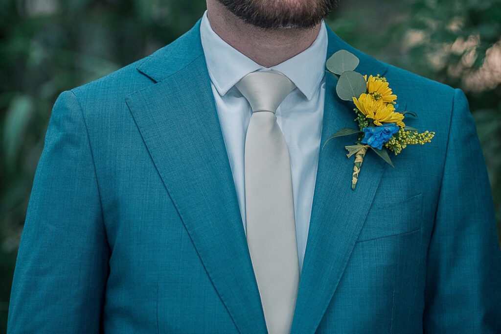 groom in a blue suit